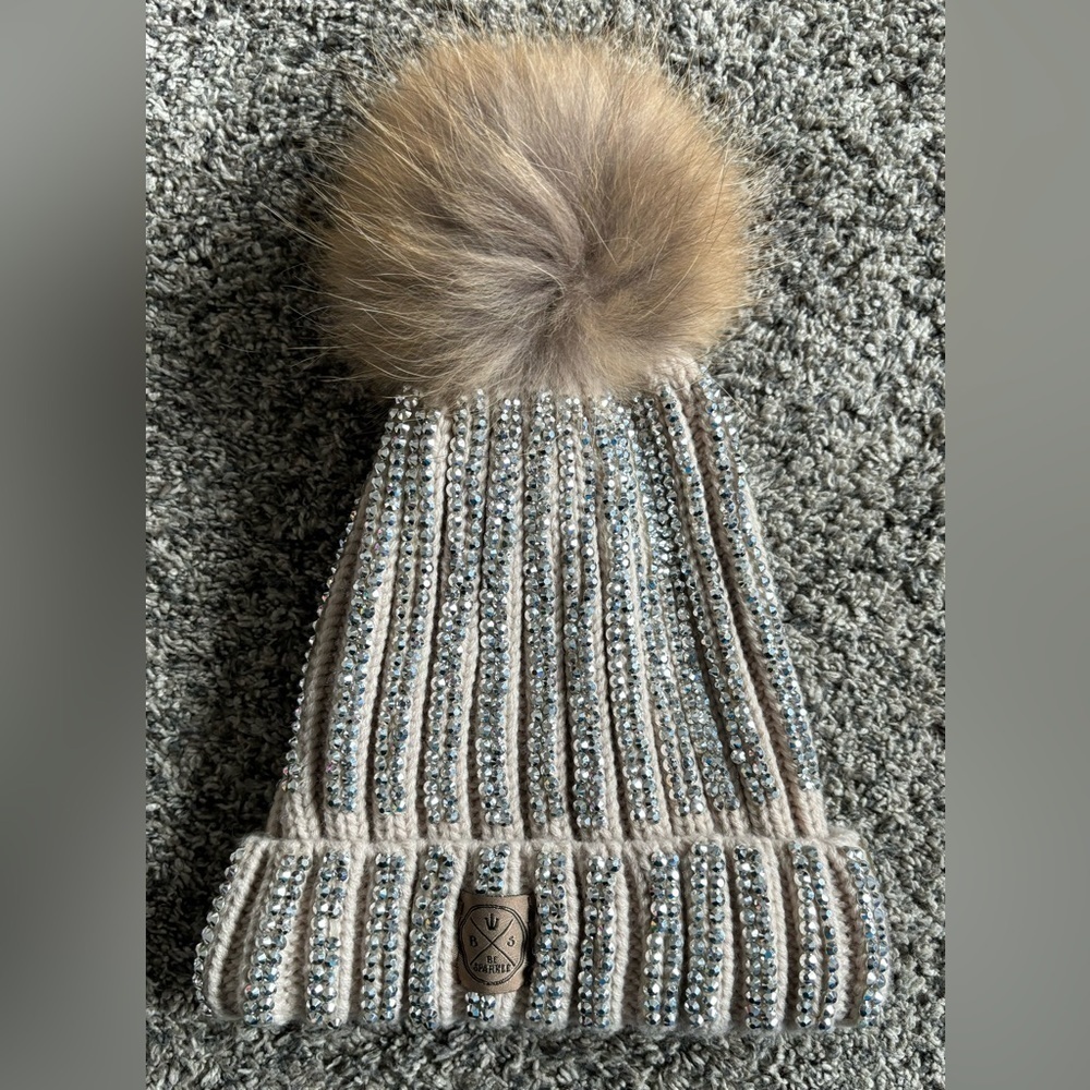 Be Sparkle Rhinestone Pom Pom beige hat.‎